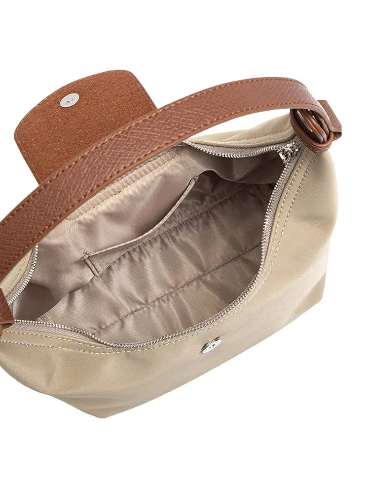 Bolso dumpling bicolor de hombro y bandolera