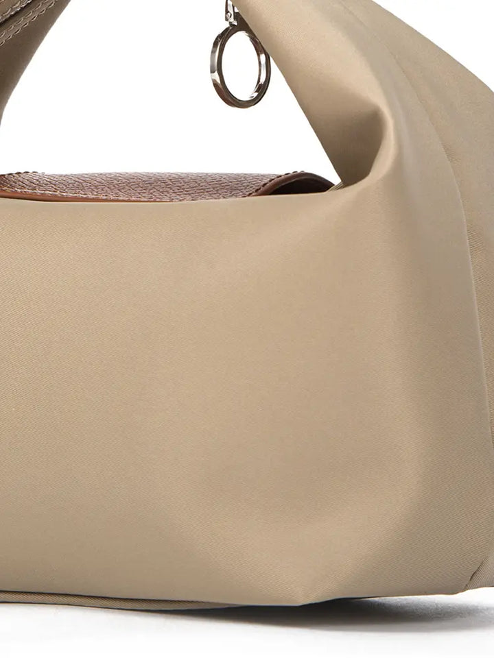 Bolso dumpling bicolor de hombro y bandolera