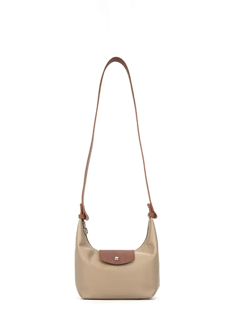 Bolso dumpling bicolor de hombro y bandolera