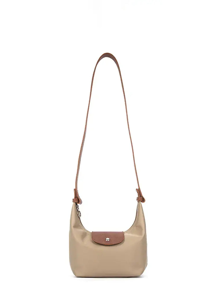 Bolso dumpling bicolor de hombro y bandolera