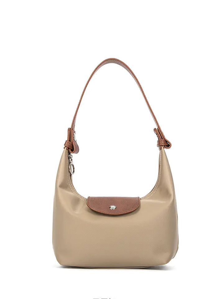 Bolso dumpling bicolor de hombro y bandolera