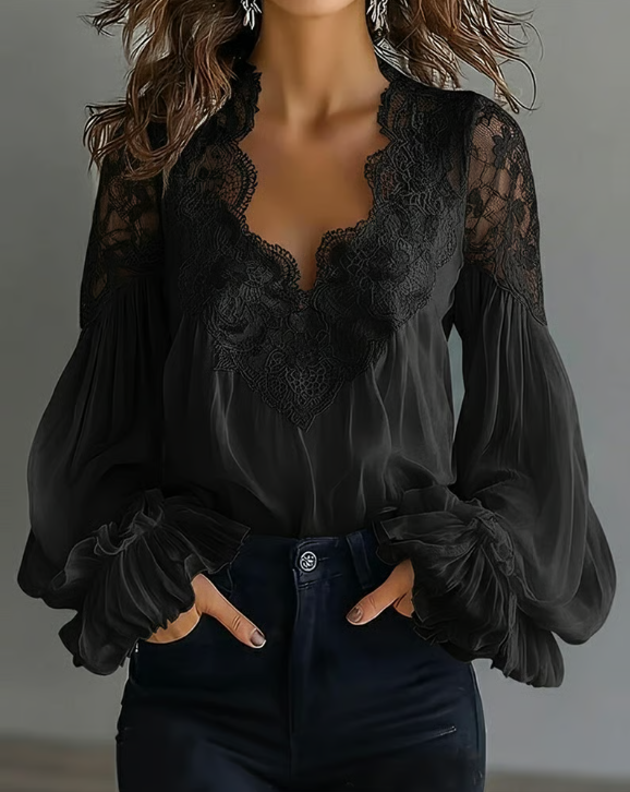 Blusa floral con mangas abullonadas