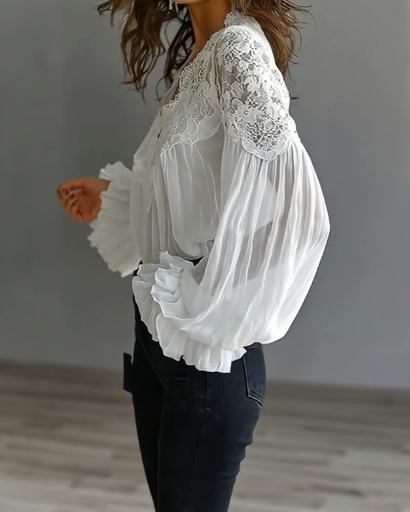 Blusa floral con mangas abullonadas