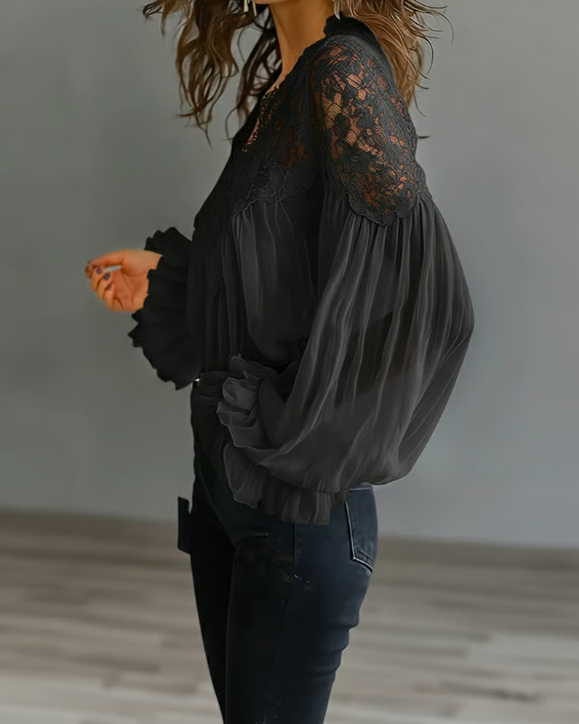 Blusa floral con mangas abullonadas
