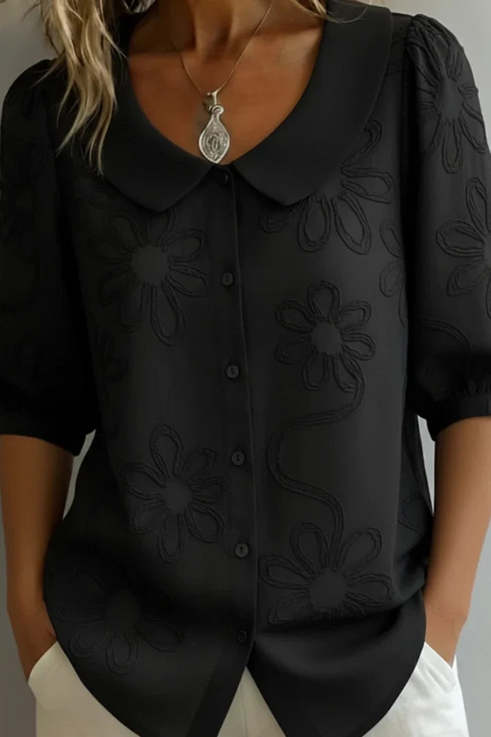 Blusa con cuello floral