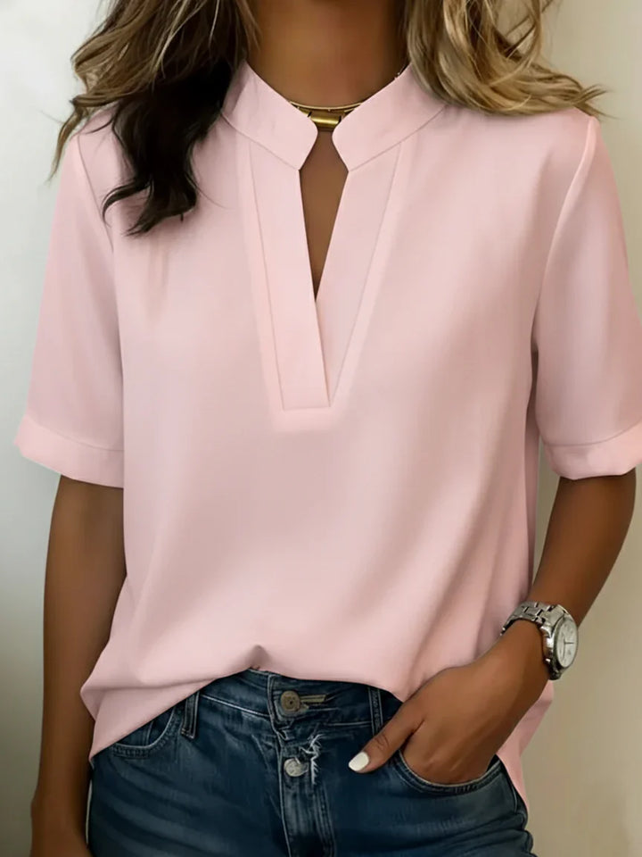 Blusa elegante con cuello refinado