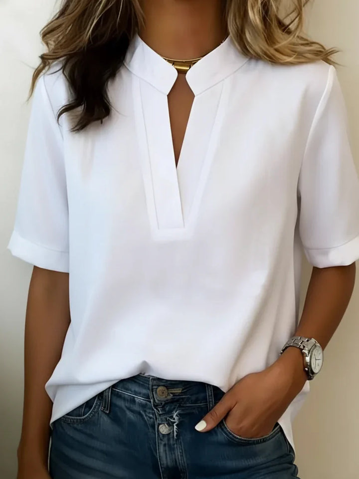 Blusa elegante con cuello refinado